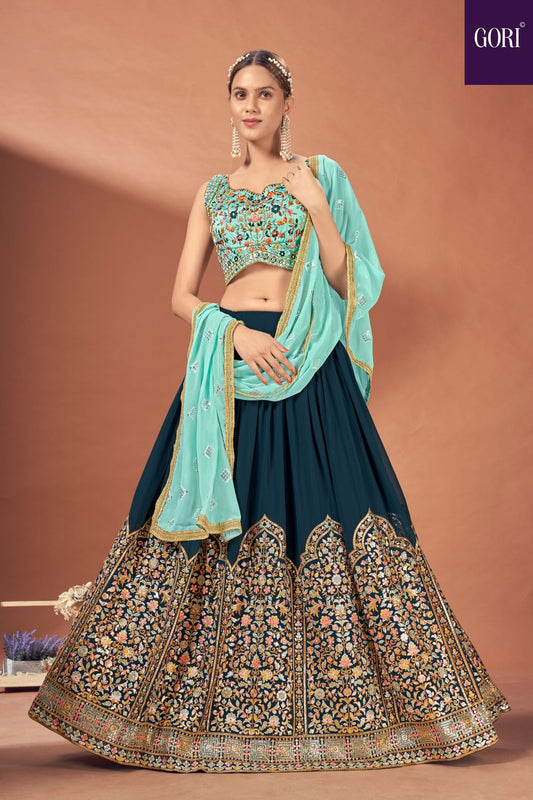 Sea blue crop top with mirror and handwork in contrast with turkish blue lehenga