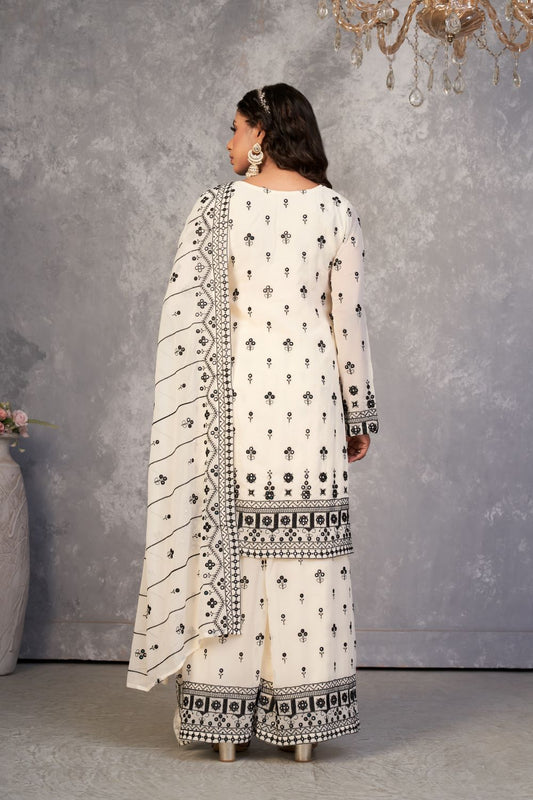 Pearlescent Perfection: White Colored Sharara Suit with Exquisite Embroidery