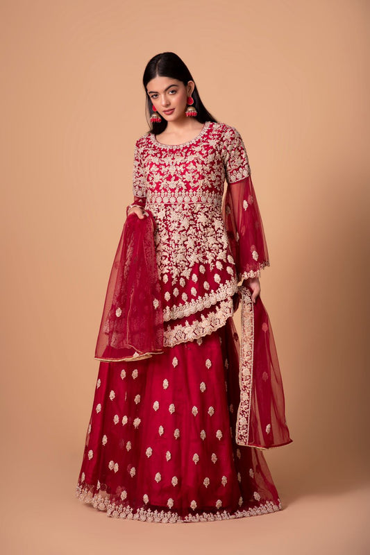 Bridal peplum sharara suit with stuffed with embroidery and diamonds