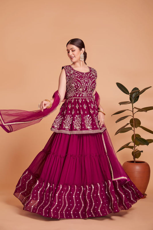 Rani pink party wear side cut peplum crop top lehenga with heavy embroidery work