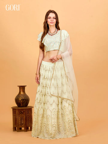 Bollywood style party wear off-white crop top lehenga with seven sequin work
