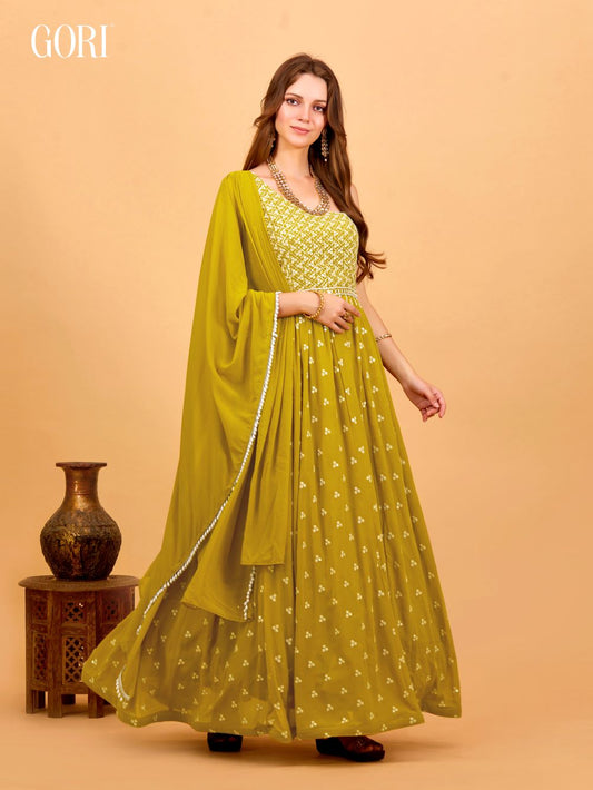 mustard colored designer drape style gown with lucknowi work